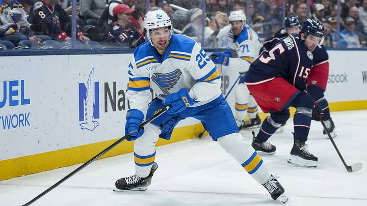 Nov 1, 2025; Columbus, Ohio, USA;  St. Louis Blues right wing Jordan Kyrou (25) skates with the puck against the Columbus Blue Jackets in the first period at Nationwide Arena. Mandatory Credit: Aaron Doster-Imagn Images