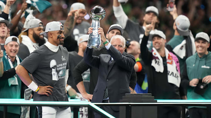 Feb 9, 2025; New Orleans, LA, USA; Philadelphia Eagles owner Jeffrey Lurie hoists the Vince Lombardi Trophy after defeating the Kansas City Chiefs in Super Bowl LIX at Ceasars Superdome. Mandatory Credit: Kirby Lee-Imagn Images