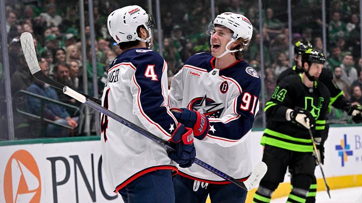 Feb 2, 2025; Dallas, Texas, USA; Columbus Blue Jackets center Cole Sillinger (4) and center Kent Johnson (91) celebrates a goal scored by Sillinger against the Dallas Stars during the first period at the American Airlines Center. Mandatory Credit: Jerome Miron-Imagn Images Feb 2, 2025; Dallas, Texas, USA; Columbus Blue Jackets center Cole Sillinger (4) and center Kent Johnson (91) celebrates a goal scored by Sillinger against the Dallas Stars during the first period at the American Airlines Center. Mandatory Credit: Jerome Miron-Imagn Images