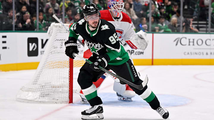 Jan 4, 2026; Dallas, Texas, USA; Montreal Canadiens goaltender Sam Montembeault (35) and Dallas Stars center Matt Duchene (95) look for the puck during the game between the Stars and the Canadiens at the American Airlines Center. Mandatory Credit: Jerome Miron-Imagn Images