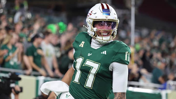 Nov 6, 2025; Tampa, Florida, USA; South Florida Bulls quarterback Byrum Brown (17) celebrates after they scored a touchdown against the UTSA Roadrunners during the second quarter at Raymond James Stadium. Mandatory Credit: Kim Klement Neitzel-Imagn Images
