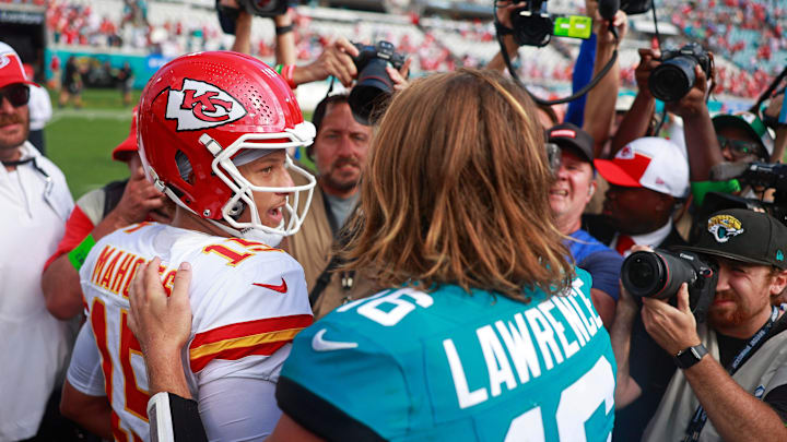 Kansas City Chiefs quarterback Patrick Mahomes (15) says goodbye to Jacksonville Jaguars quarterback