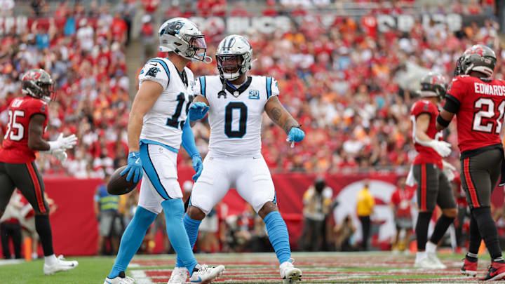 Dec 29, 2024; Tampa, Florida, USA; Carolina Panthers wide receiver Adam Thielen (19) celebrates after scoring a touchdown against the Tampa Bay Buccaneers in the first quarter at Raymond James Stadium. Mandatory Credit: Nathan Ray Seebeck-Imagn Images Dec 29, 2024; Tampa, Florida, USA; Carolina Panthers wide receiver Adam Thielen (19) celebrates after scoring a touchdown against the Tampa Bay Buccaneers in the first quarter at Raymond James Stadium. Mandatory Credit: Nathan Ray Seebeck-Imagn Images
