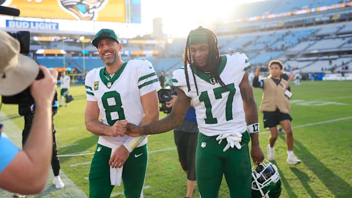 Aaron Rodgers and DaVante Adams celebrate the Jets’ fourth win of the season.