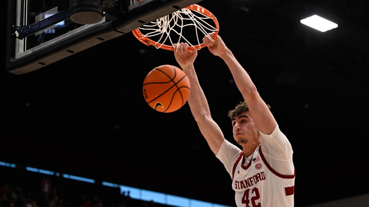 Feb 8, 2025; Stanford, California, USA; Stanford Cardinal forward Maxime Raynaud (42) dunks against the NC State Wolfpack in the second half at Maples Pavilion. Mandatory Credit: Eakin Howard-Imagn Images