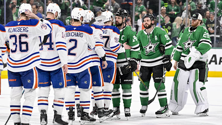 May 29, 2025; Dallas, Texas, USA; Edmonton Oilers center Connor McDavid (97) and Dallas Stars left wing Jamie Benn (14) shake hands after the game between the Dallas Stars and the Edmonton Oilers in game five of the Western Conference Final of the 2025 Stanley Cup Playoffs at American Airlines Center. Mandatory Credit: Jerome Miron-Imagn Images