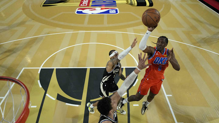 Dec 17, 2024; Las Vegas, Nevada, USA; Oklahoma City Thunder forward Jalen Williams (8) shoots against Milwaukee Bucks guard Gary Trent Jr. (5) during the Emirates NBA Cup championship game at T-Mobile Arena. Mandatory Credit: Kyle Terada-Imagn Images Dec 17, 2024; Las Vegas, Nevada, USA; Oklahoma City Thunder forward Jalen Williams (8) shoots against Milwaukee Bucks guard Gary Trent Jr. (5) during the Emirates NBA Cup championship game at T-Mobile Arena. Mandatory Credit: Kyle Terada-Imagn Images