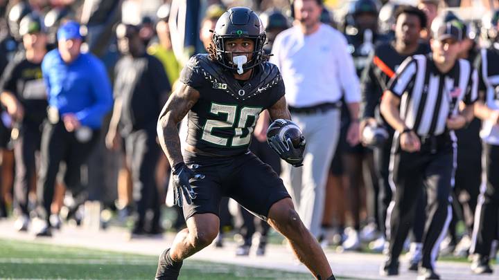 Oct 12, 2024; Eugene, Oregon, USA; Oregon Ducks running back Jordan James (20) runs the ball during the first half against the Ohio State Buckeyes at Autzen Stadium. Mandatory Credit: Craig Strobeck-Imagn Images Oct 12, 2024; Eugene, Oregon, USA; Oregon Ducks running back Jordan James (20) runs the ball during the first half against the Ohio State Buckeyes at Autzen Stadium. Mandatory Credit: Craig Strobeck-Imagn Images