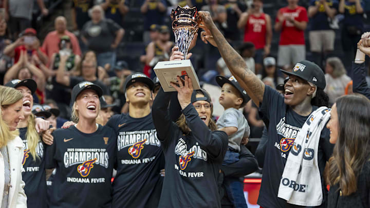 Jul 1, 2025; Minneapolis, Minnesota, USA; Indiana Fever head coach Stephanie White holds up the Commissioner's Cup trophy with Indiana Fever forward Natasha Howard (6) after defeating the Minnesota Lynx at Target Center. Mandatory Credit: Jesse Johnson-Imagn Images Jul 1, 2025; Minneapolis, Minnesota, USA; Indiana Fever head coach Stephanie White holds up the Commissioner's Cup trophy with Indiana Fever forward Natasha Howard (6) after defeating the Minnesota Lynx at Target Center. Mandatory Credit: Jesse Johnson-Imagn Images