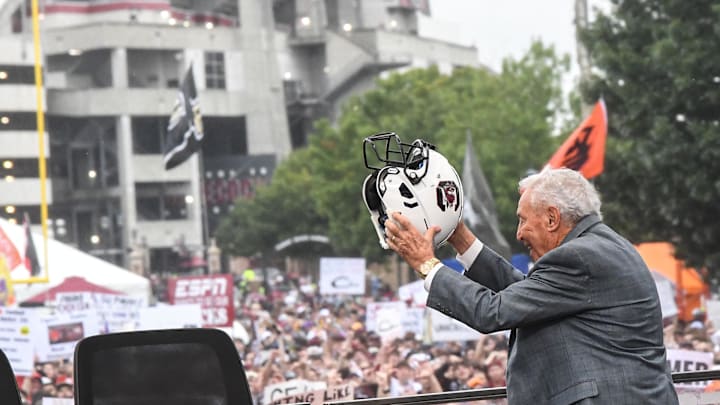 Lee Corso raises a South Carolina helmet before live broadcast during ESPN Gameday near Williams-Brice Stadium in Columbia, S.C.Saturday, September 14, 2024.