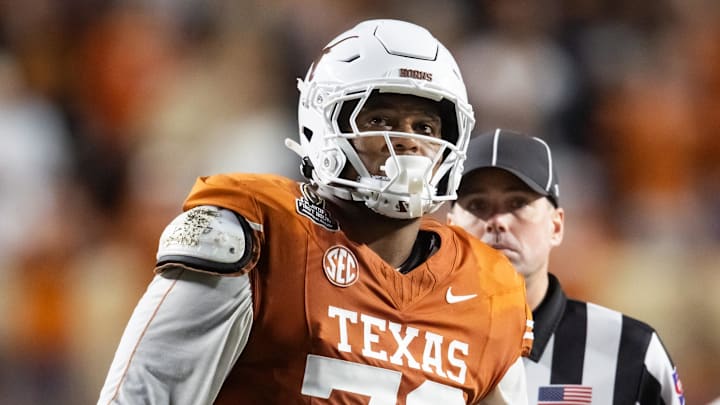 Dec 21, 2024; Austin, Texas, USA; Texas Longhorns offensive lineman Kelvin Banks Jr. (78) against the Clemson Tigers during the CFP National playoff first round at Darrell K Royal-Texas Memorial Stadium. Mandatory Credit: Mark J. Rebilas-Imagn Images