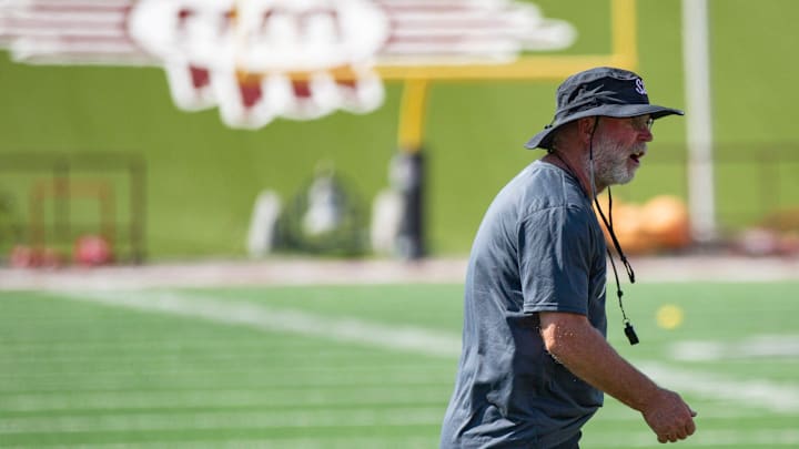 NMSU head coach Jerry Kill watches his team runs through drills during a practice on Wednesday, July 26, 2023, at the Aggie Memorial Stadium.