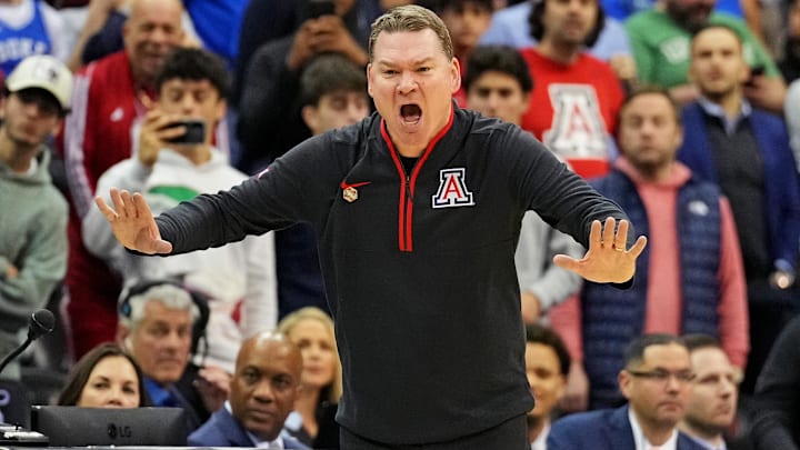 Mar 27, 2025; Newark, NJ, USA; Arizona Wildcats head coach Tommy Lloyd during the second half against the Duke Blue Devils during an East Regional semifinal of the 2025 NCAA tournament at Prudential Center. Mandatory Credit: Robert Deutsch-Imagn Images Mar 27, 2025; Newark, NJ, USA; Arizona Wildcats head coach Tommy Lloyd during the second half against the Duke Blue Devils during an East Regional semifinal of the 2025 NCAA tournament at Prudential Center. Mandatory Credit: Robert Deutsch-Imagn Images
