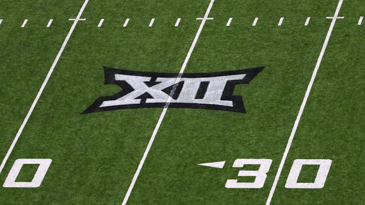Sep 6, 2025; Lubbock, Texas, USA;  A general view of the Big 12 logo on the field during the game between the Kent State Golden Flashes and the Texas Tech Red Raiders at Jones AT&T Stadium. Mandatory Credit: Michael C. Johnson-Imagn Images