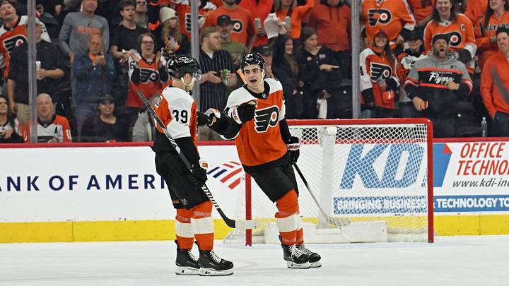 Apr 14, 2026; Philadelphia, Pennsylvania, USA; Philadelphia Flyers right wing Porter Martone (94) celebrates his goal with right wing Matvei Michkov (39) against the Montreal Canadiens during the first period at Xfinity Mobile Arena.