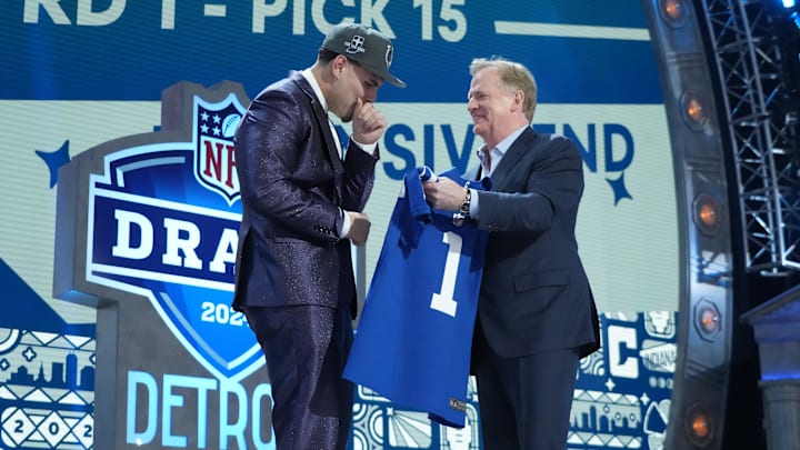 Apr 25, 2024; Detroit, MI, USA; UCLA Bruins defensive lineman Laiatu Latu greets NFL commissioner Roger Goodell after being selected by the Indianapolis Colts as the No. 15 pick in the first round of the 2024 NFL Draft at Campus Martius Park and Hart Plaza. Mandatory Credit: Kirby Lee-Imagn Images Apr 25, 2024; Detroit, MI, USA; UCLA Bruins defensive lineman Laiatu Latu greets NFL commissioner Roger Goodell after being selected by the Indianapolis Colts as the No. 15 pick in the first round of the 2024 NFL Draft at Campus Martius Park and Hart Plaza. Mandatory Credit: Kirby Lee-Imagn Images