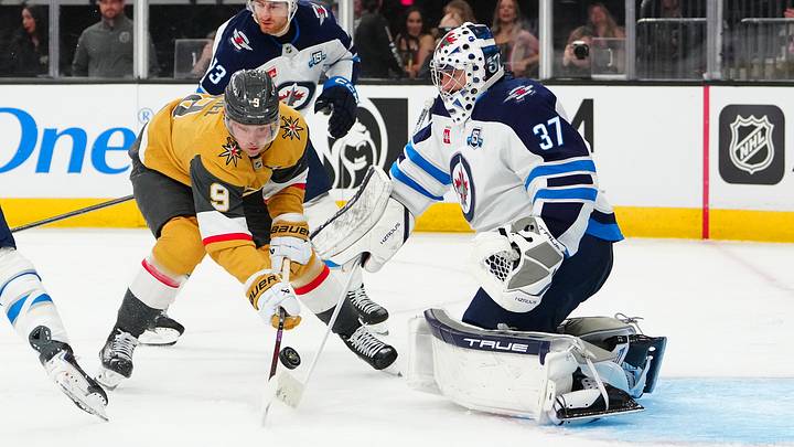Apr 13, 2026; Las Vegas, Nevada, USA; Winnipeg Jets goaltender Connor Hellebuyck (37) makes a save against Vegas Golden Knights center Jack Eichel (9) during the second period at T-Mobile Arena. Mandatory Credit: Stephen R. Sylvanie-Imagn Images Apr 13, 2026; Las Vegas, Nevada, USA; Winnipeg Jets goaltender Connor Hellebuyck (37) makes a save against Vegas Golden Knights center Jack Eichel (9) during the second period at T-Mobile Arena. Mandatory Credit: Stephen R. Sylvanie-Imagn Images