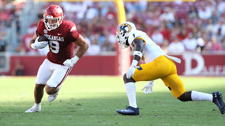 Sep 9, 2023; Fayetteville, Arkansas, USA; Arkansas Razorbacks tight end Luke Hasz (9) runs after a catch during the fourth quarter against the Kent State Golden Flashes at Donald W. Reynolds Razorback Stadium. Arkansas won 28-6. Mandatory Credit: Nelson Chenault-Imagn Images