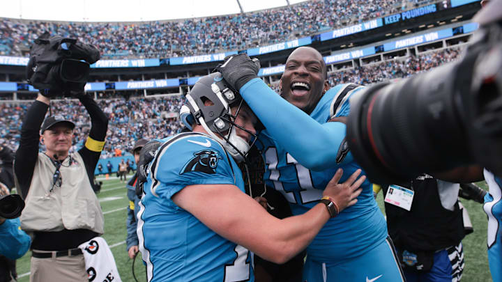 Oct 12, 2025; Charlotte, North Carolina, USA; Carolina Panthers kicker Ryan Fitzgerald (10) celebrates a win against the Dallas Cowboys with linebacker Nic Scourton (11) at Bank of America Stadium. Mandatory Credit: Scott Kinser-Imagn Images