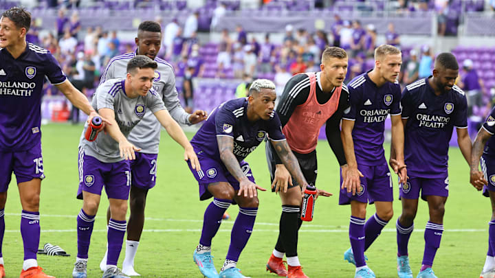 Feb 27, 2022; Orlando, Florida, USA; Orlando City SC defender Ruan (2), forward Facundo Torres (17)