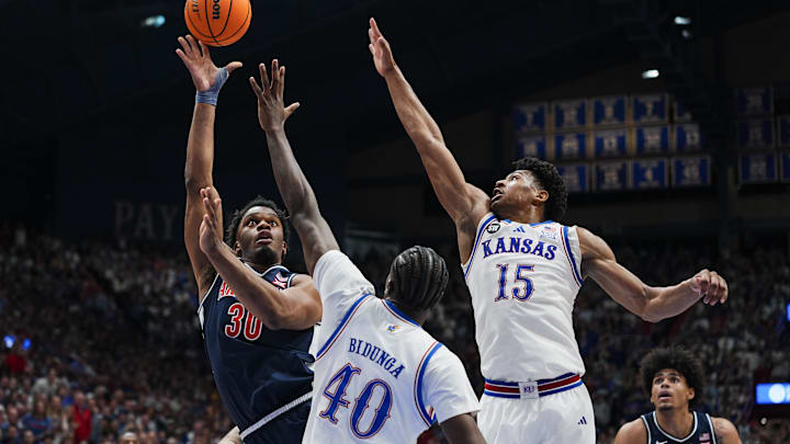 Kansas Jayhawks forward Flory Bidunga (40) and forward Bryson Tiller (15)