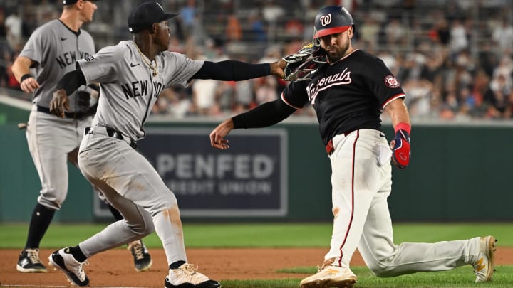 Aug 28, 2024; Washington, District of Columbia, USA; Washington Nationals first baseman Joey Gallo is thrown out at third base/ Aug 28, 2024; Washington, District of Columbia, USA; Washington Nationals first baseman Joey Gallo is thrown out at third base/