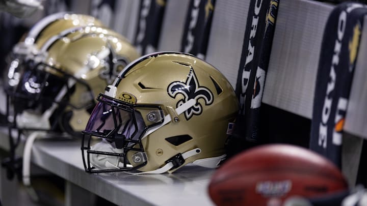 Nov 5, 2023; New Orleans, Louisiana, USA;  Detailed view of the New Orleans Saints helmets on the team bench against the Chicago Bears during the first half at the Caesars Superdome. Mandatory Credit: Stephen Lew-Imagn Images