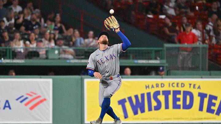 Jun 12, 2026; Boston, Massachusetts, USA; Texas Rangers right fielder Brandon Nimmo (24) makes a catch for an out against the Boston Red Sox during the sixth inning at Fenway Park. Mandatory Credit: Eric Canha-Imagn Images