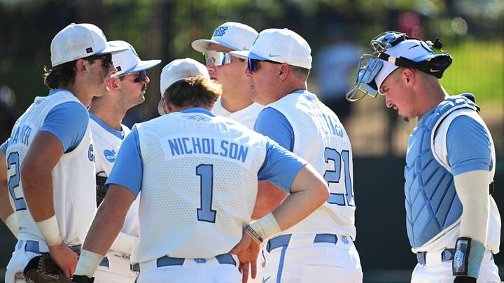 Jun 5, 2026; Chapel Hill, NC, USA;  North Carolina Tar Heels head coach Scott Forbes makes a visit to the mound in the seventh inning against the USC Trojans at Boshamer Stadium. Mandatory Credit: Zachary Taft-Imagn Images
