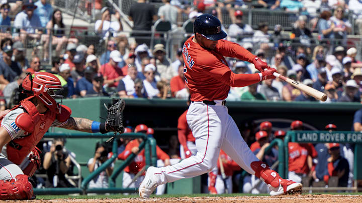 Mar 11, 2025; Fort Myers, Florida, USA;  Boston Red Sox Alex Bregman (2) connects with the ball in the first inning of their game with the Phillies  at JetBlue Park at Fenway South. 