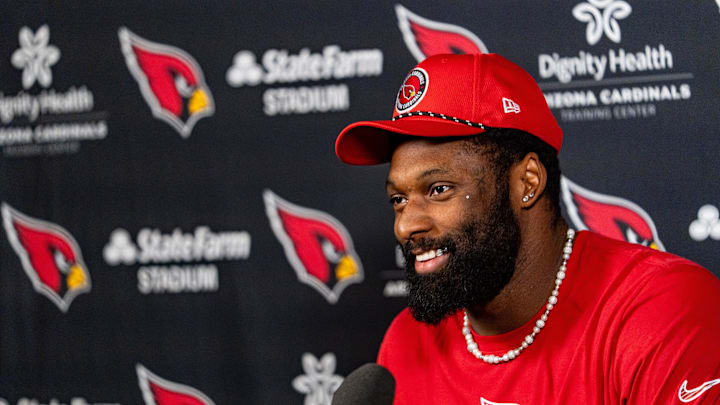 Josh Sweat speaks to members of the media at the Arizona Cardinals Training Center in Tempe on March 13, 2025.