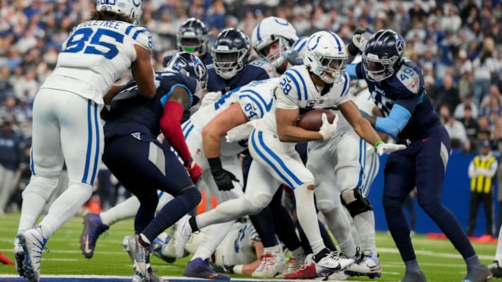 Indianapolis Colts running back Jonathan Taylor (28) rushes for a touchdown Sunday, Dec. 22, 2024, during a game against the Tennessee Titans at Lucas Oil Stadium in Indianapolis.