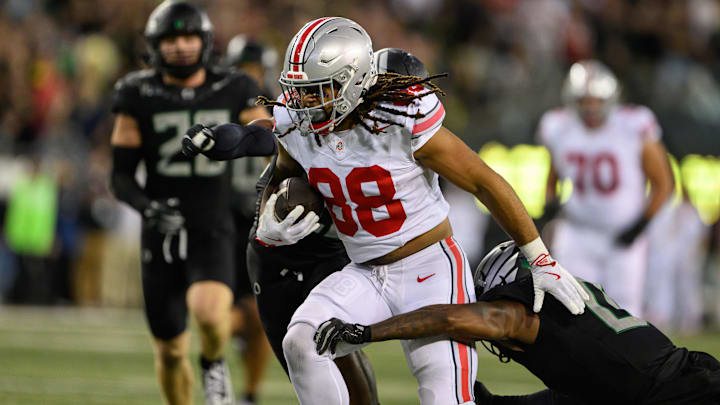 Oct 12, 2024; Eugene, Oregon, USA; Ohio State Buckeyes tight end Gee Scott Jr. (88) runs the ball after a catch during the third quarter against the Oregon Ducks at Autzen Stadium. Mandatory Credit: Craig Strobeck-Imagn Images Oct 12, 2024; Eugene, Oregon, USA; Ohio State Buckeyes tight end Gee Scott Jr. (88) runs the ball after a catch during the third quarter against the Oregon Ducks at Autzen Stadium. Mandatory Credit: Craig Strobeck-Imagn Images