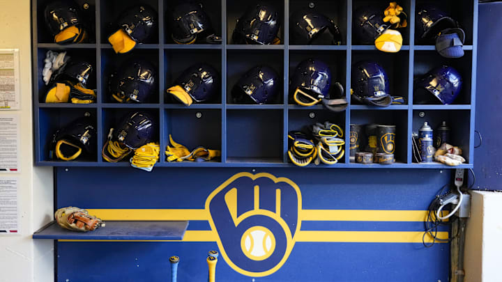 Sep 17, 2024; Milwaukee, Wisconsin, USA; General view of batting helmets inside the Milwaukee Brewers dugout prior to the game against the Philadelphia Phillies at American Family Field. Mandatory Credit: Jeff Hanisch-Imagn Images Sep 17, 2024; Milwaukee, Wisconsin, USA; General view of batting helmets inside the Milwaukee Brewers dugout prior to the game against the Philadelphia Phillies at American Family Field. Mandatory Credit: Jeff Hanisch-Imagn Images