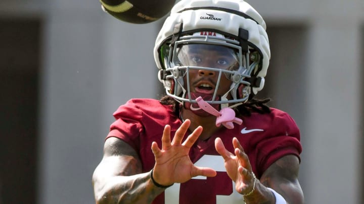 The Crimson Tide football team continued practice Thursday, Aug. 1, 2024, as they prepare for the season opener and the first game under new head coach Kalen DeBoer. Alabama defensive back Malachi Moore (13) snags a pass during a defensive drill.