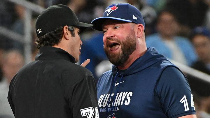 Toronto Blue Jays manager john Schneider argues with umpire John Trumpane. Toronto Blue Jays manager john Schneider argues with umpire John Trumpane.