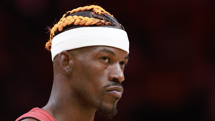 Dec 12, 2024; Miami, Florida, USA;  Miami Heat forward Jimmy Butler (22) stands on the court during a time out against the Toronto Raptors  during the first half at Kaseya Center. Mandatory Credit: Rhona Wise-Imagn Images
