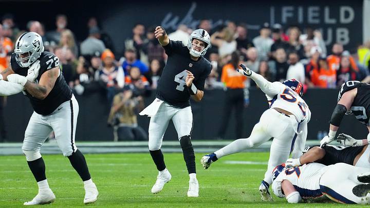 Jan 7, 2024; Paradise, Nevada, USA; Las Vegas Raiders quarterback Aidan O'Connell (4) throws against the Denver Broncos during the fourth quarter at Allegiant Stadium. Mandatory Credit: Stephen R. Sylvanie-USA TODAY Sports