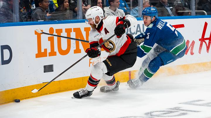 Mar 9, 2026; Vancouver, British Columbia, CAN;  Vancouver Canucks defenseman Tom Willander (5) defends against Ottawa Senators forward Claude Giroux (28) in the third period at Rogers Arena. Mandatory Credit: Bob Frid-Imagn Images