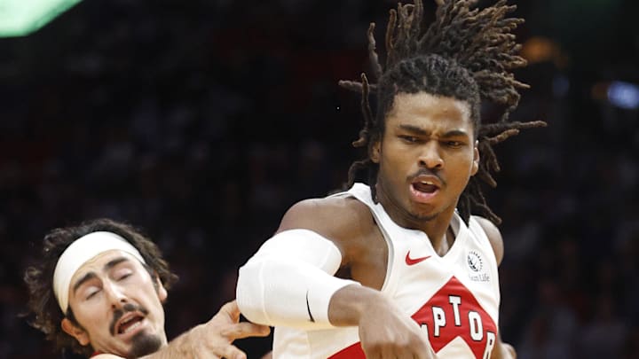 Miami Heat forward Jaime Jaquez Jr. knocks the ball away from Toronto Raptors forward Collin Murray-Boyles. Miami Heat forward Jaime Jaquez Jr. knocks the ball away from Toronto Raptors forward Collin Murray-Boyles.