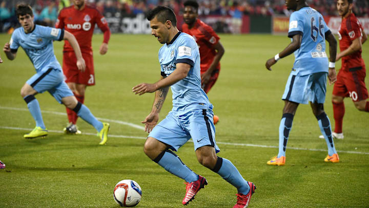 May 27, 2015; Toronto, Ontario, Canada; Manchester City forward Sergio Aguero (16) dribbles into the Toronto FC penalty area in the second half of an international club friendly at BMO Field. Mandatory Credit: Dan Hamilton-Imagn Images