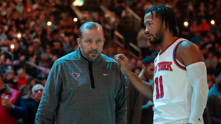 Nov 20, 2022; Phoenix, Arizona, USA; New York Knicks head coach Tom Thibodeau with guard Jalen Brunson (11) against the Phoenix Suns at Footprint Center. Mandatory Credit: Mark J. Rebilas-Imagn Images