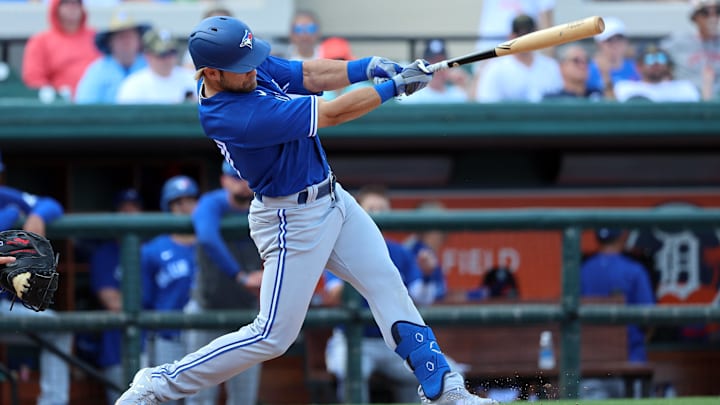 Mar 4, 2023; Lakeland, Florida, USA;  Toronto Blue Jays infielder Vinny Capra (47) hits a RBI double against the Detroit Tigers during the fourth inning at Publix Field at Joker Marchant Stadium. 