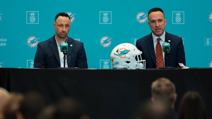 Miami Dolphins head coach Jeff Hafley, right, joined by general manager Jon-Eric Sullivan, left, speak to reporters during their introductory press conference at Baptist Health Training Complex.