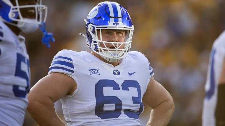 Nov 23, 2024; Tempe, Arizona, USA; Brigham Young Cougars offensive lineman Bruce Mitchell (63) against the Arizona State Sun Devils at Mountain America Stadium. Mandatory Credit: Mark J. Rebilas-Imagn Images