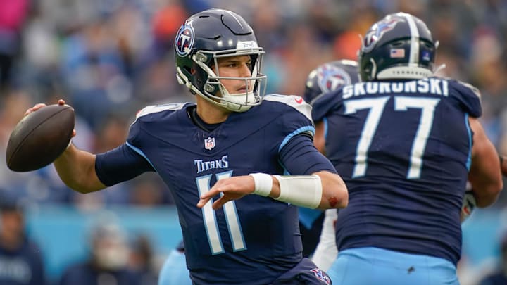 Tennessee Titans quarterback Mason Rudolph (11) looks for a receiver during the third quarter against the Cincinnati Bengals at Nissan Stadium in Nashville, Tenn., Sunday, Dec. 15, 2024.