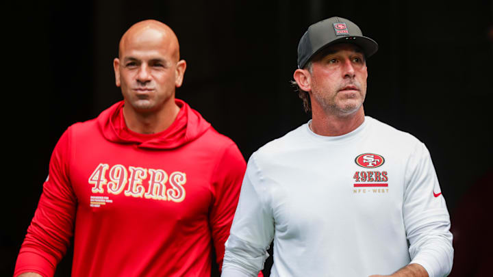 Sep 7, 2025; Seattle, Washington, USA; San Francisco 49ers defensive coordinator Robert Saleh, left, and head coach Kyle Shanahan, right, exit the locker room during pregame warmups against the Seattle Seahawks at Lumen Field. Mandatory Credit: Joe Nicholson-Imagn Images Sep 7, 2025; Seattle, Washington, USA; San Francisco 49ers defensive coordinator Robert Saleh, left, and head coach Kyle Shanahan, right, exit the locker room during pregame warmups against the Seattle Seahawks at Lumen Field. Mandatory Credit: Joe Nicholson-Imagn Images
