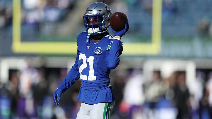 Seattle Seahawks cornerback Devon Witherspoon (21) warms up before the game against the Minnesota Vikings at Lumen Field.