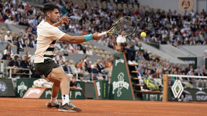 Jun 3, 2025; Paris, FR; Carlos Alcaraz of Spain returns a shot during his match