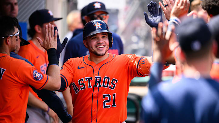 Sep 28, 2025; Anaheim, California, USA; Houston Astros catcher Yainer Diaz (21) is greeted by teammates after hitting a home run during the fifth inning against the Los Angeles Angels at Angel Stadium. 
